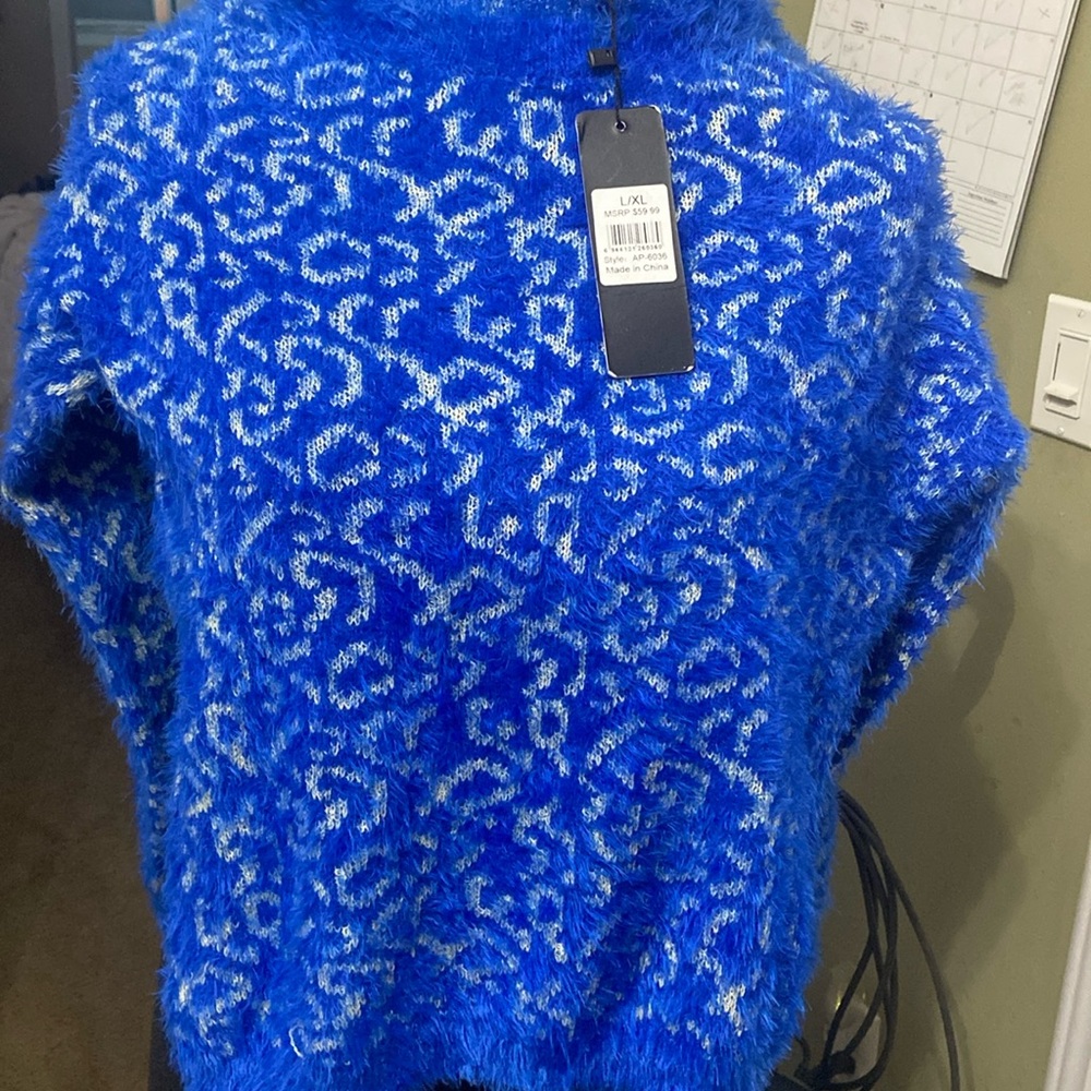 Beautiful and Soft NWT Blue Sweater by Victoria